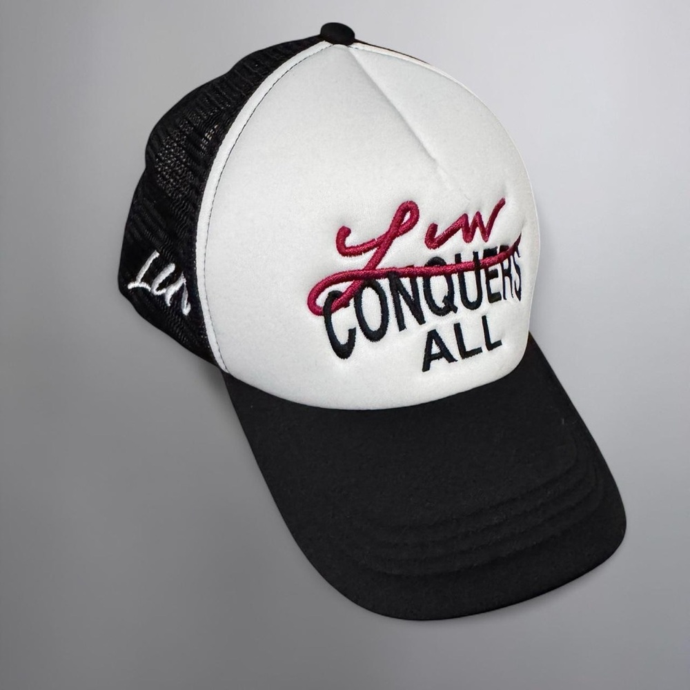 Luv Conquers All Trucker Hat